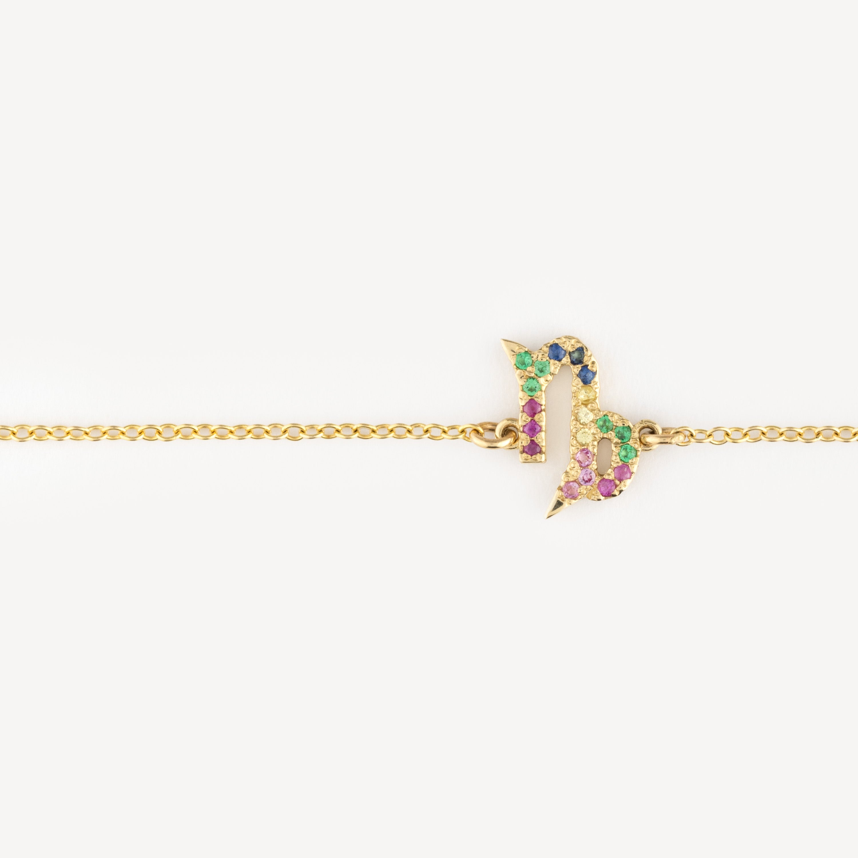 Capricorn zodiac bracelet with multicolored sapphires