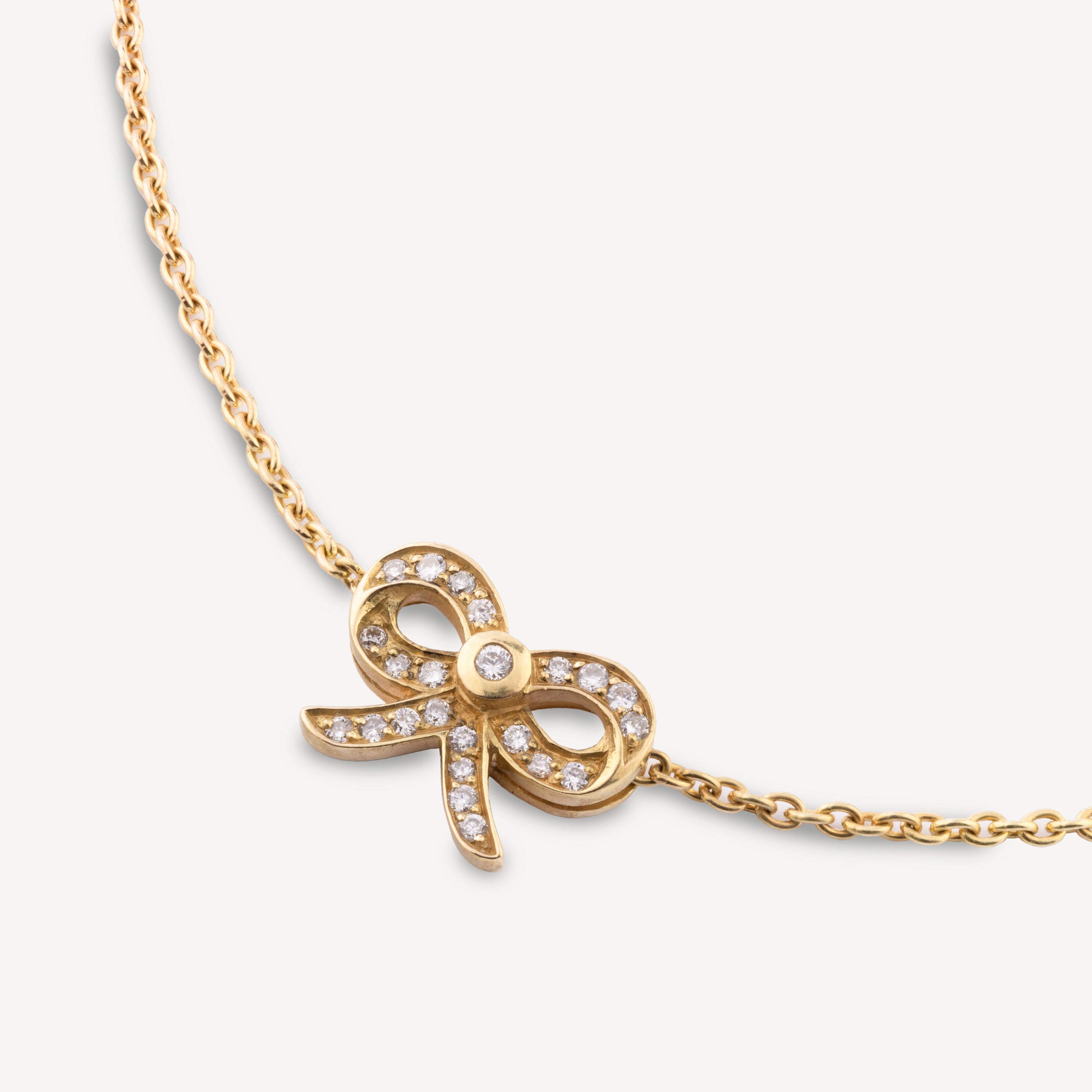 Gold mini diamond knot bracelet