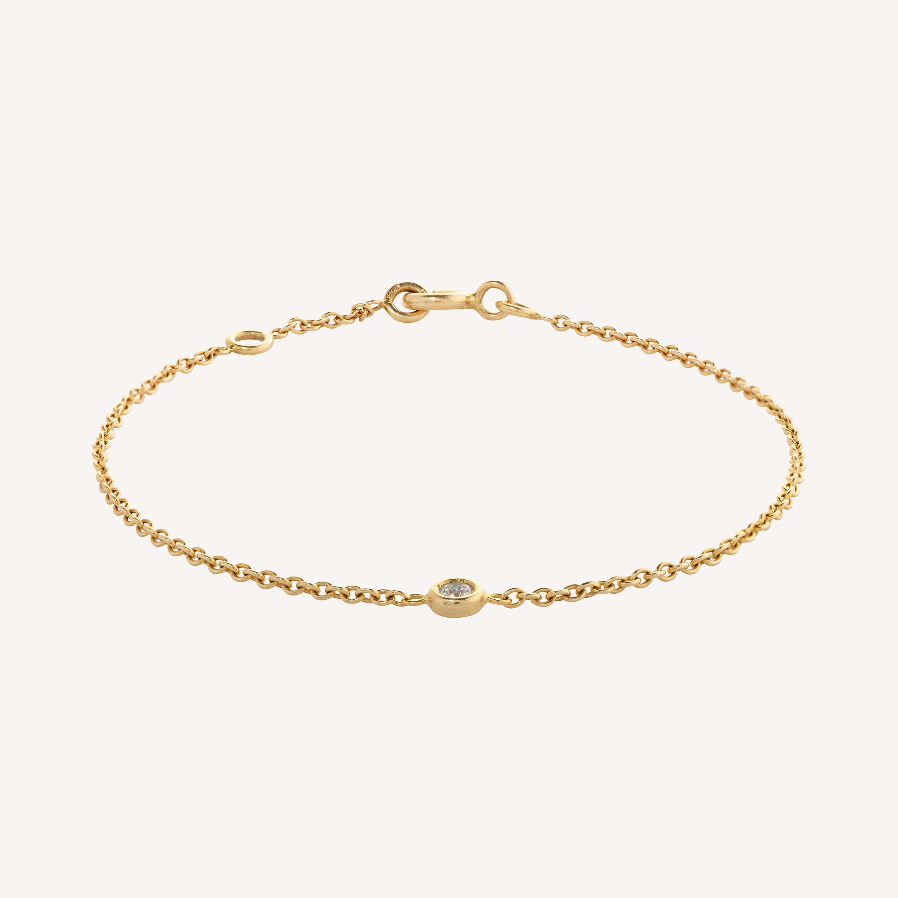 Armband aus Gold und rundem Diamant