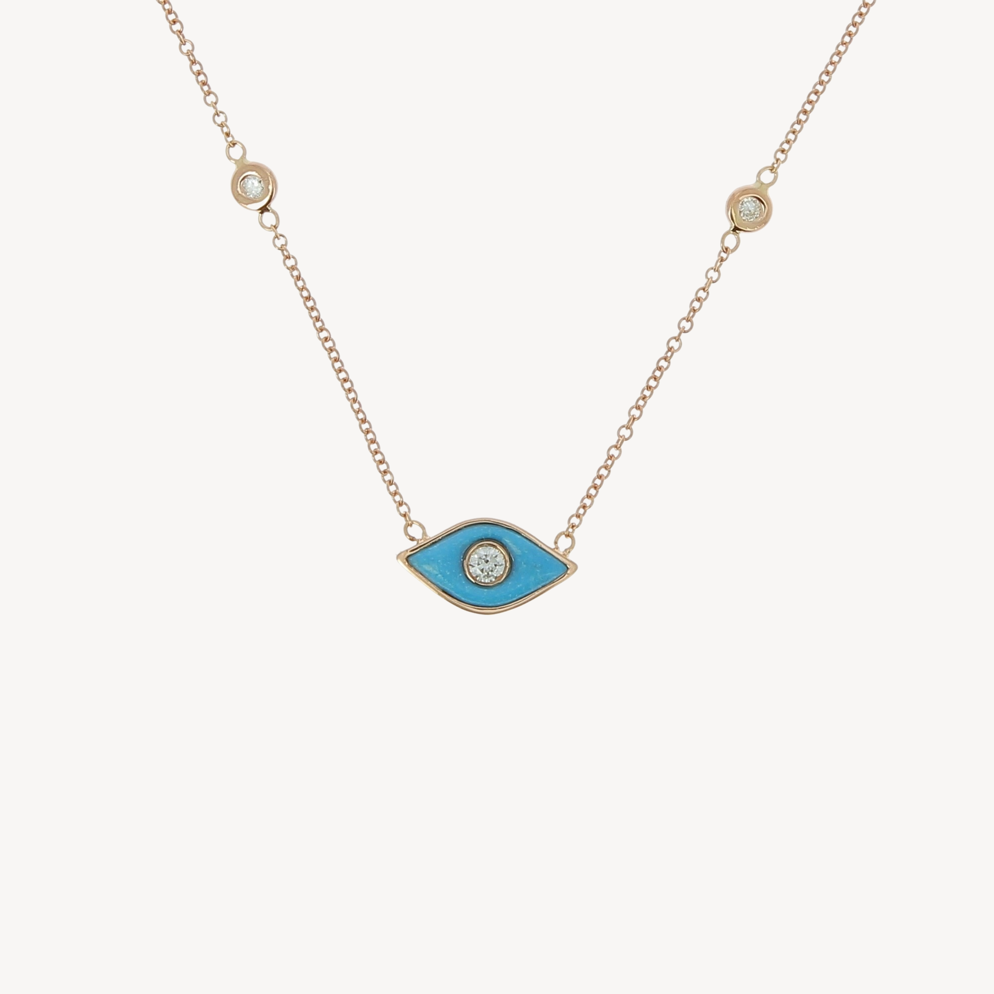 Collier oeil turquoise or rose