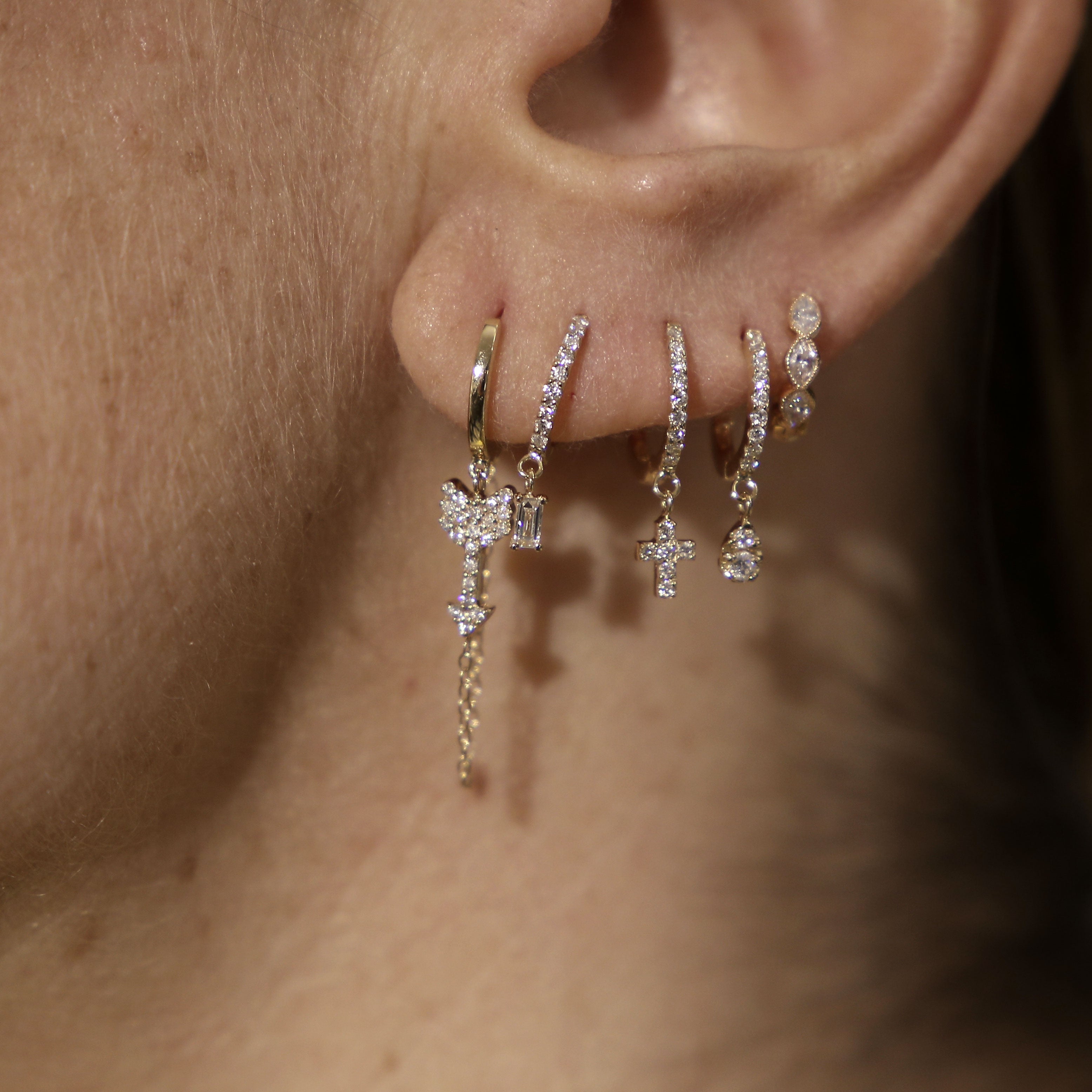 Half Paved Hoop Earring and 1 Baguette Diamond